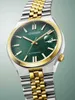 A close-up studio shot of a Citizen automatic watch with a green dial and a two-tone gold and silver bracelet. Voir les images du produit