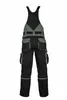 A back view of black and gray work overalls against a white background. Produktbild-Vorschau