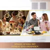A collage showing two scenes: one of a family/friends gathered around a dinner table with Christmas lights in the background, and another of a couple enjoying a fondue with a chocolate fountain. Podgląd zdjęcia produktu