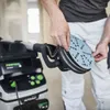 A person is holding a sanding disc over a Festool sander. Náhled obrázku produktu