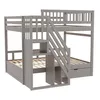 A grey wooden bunk bed with stairs and storage. Voir les images du produit