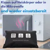 A black heat pack is shown in front of a microwave, with text overlays indicating instructions for heating. Produktbild-Vorschau