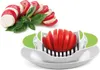 A tomato slicer with a sliced tomato and a caprese salad. Produktbild-Vorschau