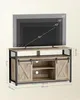 A TV stand with a television on top, showing different TV sizes that fit. Dimensions are also indicated. Voir les images du produit