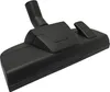A close-up studio shot of a black vacuum cleaner floor nozzle. Voir les images du produit