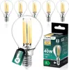 A product shot of LED light bulbs and their packaging, with some bulbs arranged in the foreground and background. Produktbild-Vorschau