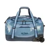 A blue Tatonka Barrel Roller 60L travel bag with wheels, shown against a white background. Produktbild-Vorschau