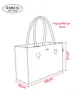A line drawing of a tote bag with dimensions indicated by red lines and text. Produktbild-Vorschau