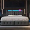 A modern bedroom with a grey upholstered bed frame featuring LED lighting and storage drawers. Anteprima dell’immagine prodotto
