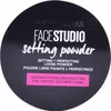 The image shows the top of a round container of Maybelline Face Studio Setting Powder. Voir les images du produit