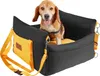 A dog sits in a car seat designed for pets. Náhled obrázku produktu