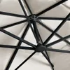 Close-up view of the internal structure of an umbrella, showing the metal ribs and fabric. Produktbild-Vorschau