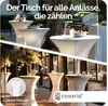 Collage of images showing white cocktail tables in different settings, one with a grill and food, another with floral arrangements, and a close-up of a table base. Produktbild-Vorschau