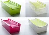 A collage of four images showing different colored spice bag dispensers. Náhľad obrázku produktu