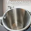 Close-up interior view of a stainless steel kettle, highlighting its material and markings. Náhled obrázku produktu
