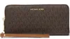 A brown Michael Kors wallet with a tan wrist strap is shown against a white background. Podgląd zdjęcia produktu