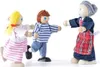 Three wooden dolls are arranged in a line, facing each other. Náhľad obrázku produktu