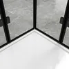 A close-up view of the corner of a shower cabin, showing the black frame, glass panels, and white shower tray. Produktbild-Vorschau