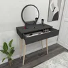 A dark gray vanity table with a round mirror and an open drawer containing makeup. Produktbild-Vorschau