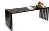 A black metal bench with a book and flowers on top, set against a white background. Produktbild-Vorschau