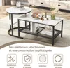 A set of nesting coffee tables with a marble pattern and black metal legs, placed on a rug in a living room setting. Decorative items are placed on the tables. Voir les images du produit