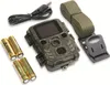 A collection of items for a trail camera, including the camera itself, batteries, a USB cable, and a strap with a clip. Produktbild-Vorschau