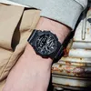 A person wearing a black Casio G-SHOCK watch on their wrist, with a blurred background of a rusty metal structure and beige fabric. Anteprima dell’immagine prodotto