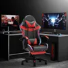 A gaming chair is set up in a gaming room with two computer monitors. Podgląd zdjęcia produktu