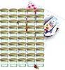 A set of glass jars with gold lids, arranged in rows, with a small recipe booklet in the background. Anteprima dell’immagine prodotto