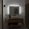 A modern bathroom vanity with a sink and illuminated mirror. Produktbild-Vorschau