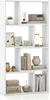 A white, multi-compartment bookshelf filled with decorative items and books. Podgląd zdjęcia produktu