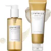 Two skincare products, a cleansing oil and a foam cleanser, are displayed against a white background with subtle cream-colored smudges. Voir les images du produit