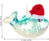 A glass Christmas ornament shaped like a fish wearing a Santa hat. Produktbild-Vorschau