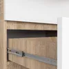 A close-up view of a drawer slide mechanism on a wooden drawer, part of a piece of furniture. Produktbild-Vorschau