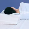 A person sleeping on their side on a pillow, with an illustration of the spine showing proper alignment. Produktbild-Vorschau