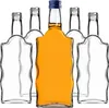 A group of glass bottles, one filled with orange liquid, against a white background. Produktbild-Vorschau