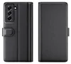A black leather flip case for a smartphone, shown from the front and back. Produktbild-Vorschau
