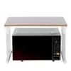 A microwave oven is placed on a shelf under a wooden countertop, supported by white metal legs. Voir les images du produit