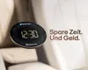 A digital parking disc with a clock display is shown in a car interior, with text overlay. Voir les images du produit