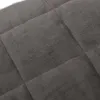 A close-up view of a quilted gray fabric, likely a weighted blanket. Produktbild-Vorschau