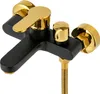 A black and gold bathtub faucet with a handheld shower attachment, isolated on a white background. Podgląd zdjęcia produktu