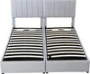 Two upholstered bed frames with slatted bases are shown side-by-side against a white background. Produktbild-Vorschau