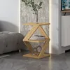 A modern living room setting with a bedside table next to a sofa. Produktbild-Vorschau