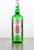 A green glass bottle of Malteserkreuz Aquavit is shown against a white background, standing on a wooden surface. Produktbild-Vorschau