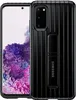 A black Samsung phone case with a kickstand is shown in front of a blurred background of purple and pink flowers. Náhled obrázku produktu