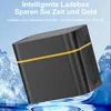 A black and yellow charging box is shown with a blue, icy background. Produktbild-Vorschau