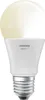 A white LED light bulb with a silver screw base. Produktbild-Vorschau