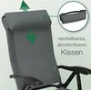 Close-up of a gray camping chair, highlighting its adjustable and removable headrest. Produktbild-Vorschau