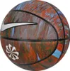 A basketball with a multi-colored, abstract design. Produktbild-Vorschau