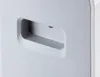 A close-up view of a recessed handle on a light gray appliance. Náhled obrázku produktu